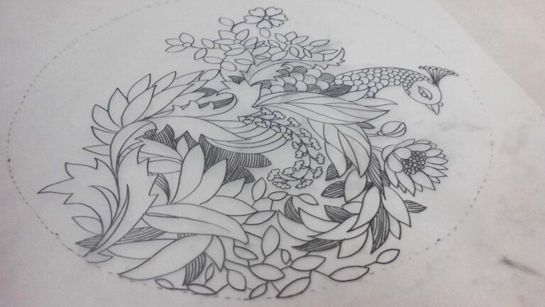 Peacock and floral motif hand-drawn on khaka tracing paper for traditional boutique embroidery.