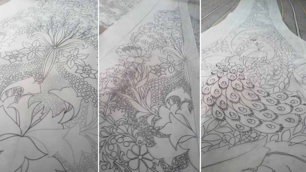 Hand-drawn peacock and floral khaka embroidery designs on tracing paper created by Asgar Molla for boutique garments.