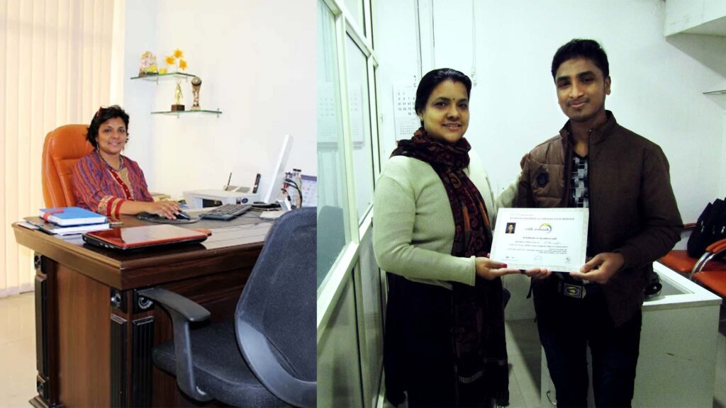 Asgar Molla receiving a certificate from his teacher at Rainbow Bliss Graphics & Animation Institute.