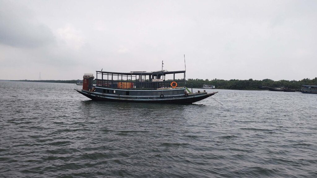 Tourist boat anchored at Gadkhali Ferry Ghat, Sundarban
