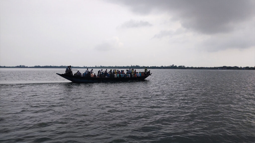 Passenger boat crossing the river at Gadkhali Ferry Ghat, Sundarban