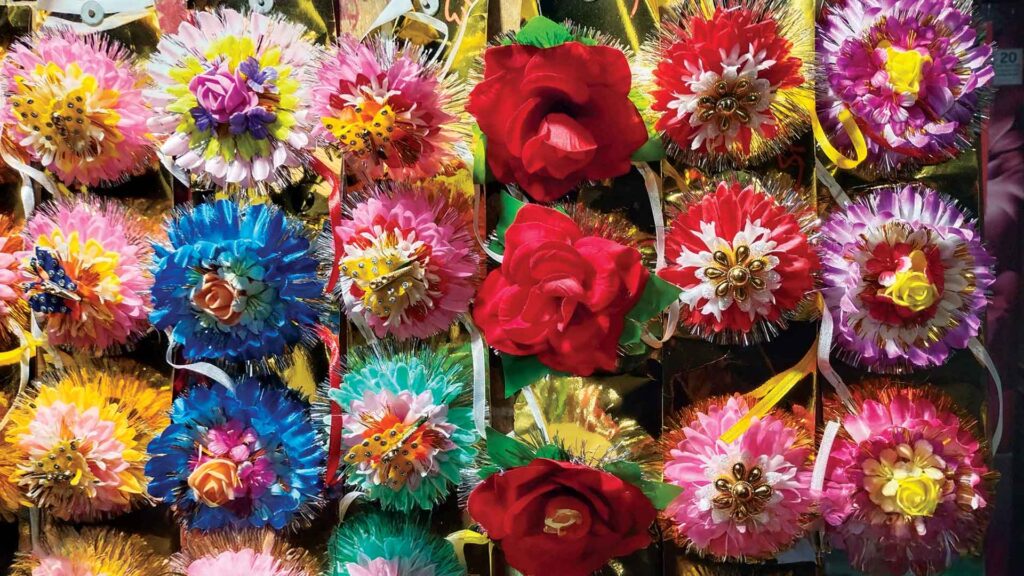 Colorful decorative rakhis displayed in a market stall for Raksha Bandhan celebration.